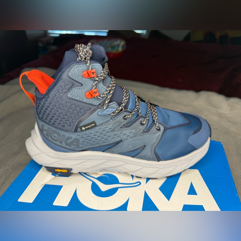 Hoka women’s Vibrant Blue and Orange Boots